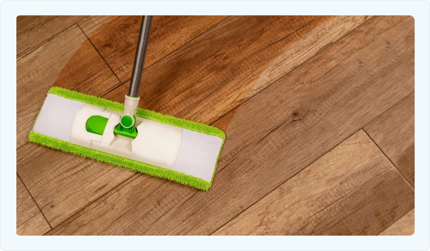 Hardwood flooring being cleaned